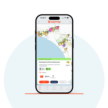 The zapmap app showing a charge point at a pub on the coast