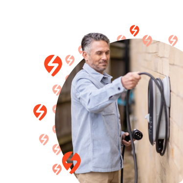 Man using home EV charger
