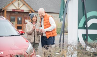 Hive partnership banner image - stock photo - couple charging using Zapmap app