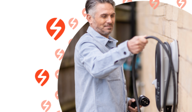 Man using home EV charger